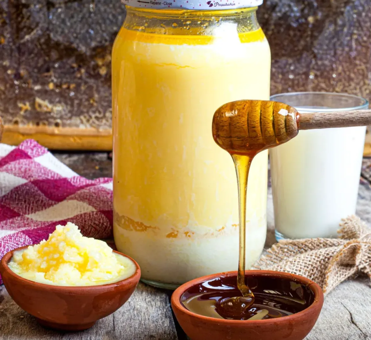 Golden ghee in a glass jar